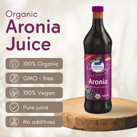 Organic Aronia Juice 700 ml glass bottle – Canada packaging, bottle on a wooden board