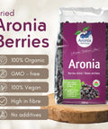 Organic Dried Aronia Berries 200 g pouch – Canada packaging, on a wooden board