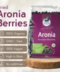 Organic Dried Aronia Berries 500 g pouch – Canada packaging, on a wooden board