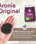 Organic Dried Aronia Berries 500 g pouch – Canada packaging, with a handful of dried berries