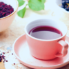 aronia berry tea in cup with loose tea